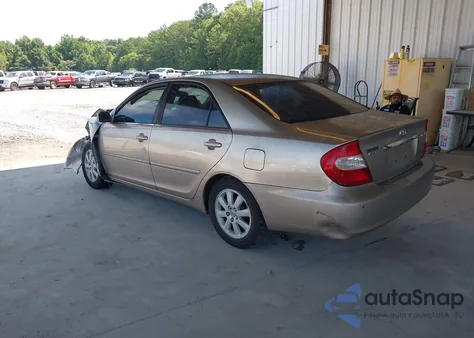 2002 Toyota Camry Xle z USA, uszkodzony, nr VIN 4T1BE30K92U551774